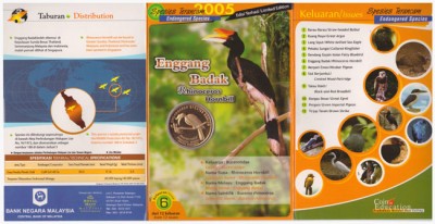 Малайзия, 25 центов, 2005 год. Монета "Enggang Badak" из двенадцати серии "Птицы", в красочном буклете.